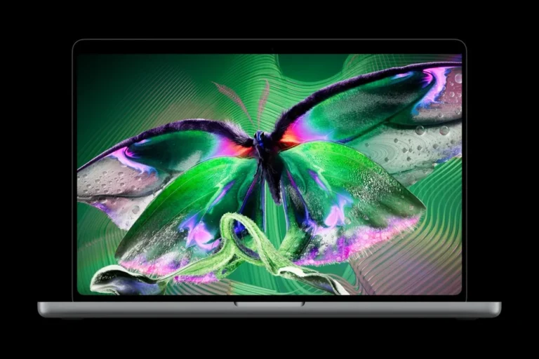 MacBook Pro with PROLED XDR Display showing a colourful butterfly